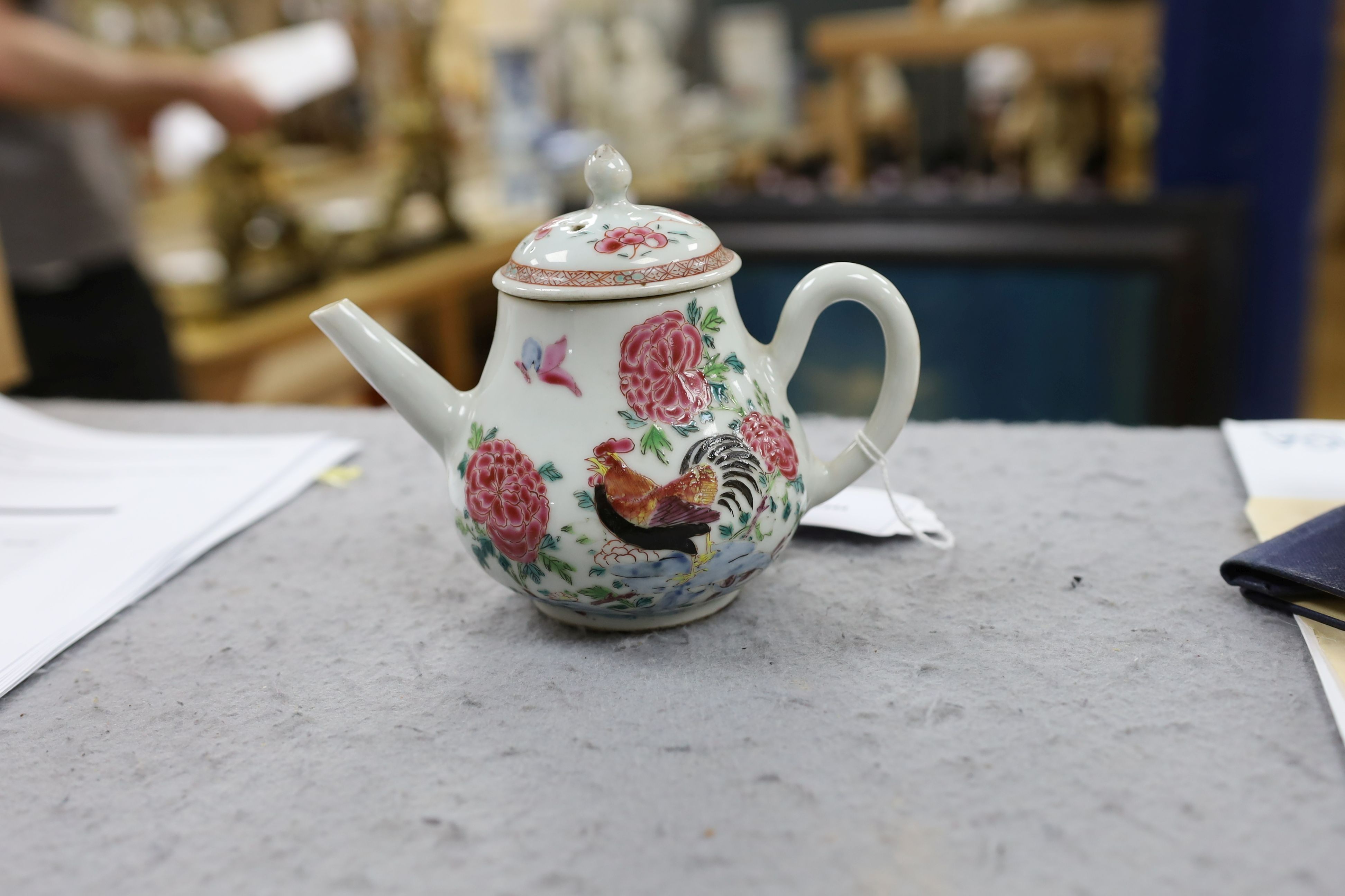 A Chinese famille rose ‘cockerel’ teapot, Yongzheng period, 12 cms high, 11.5cm high